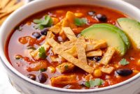 Hearty Chicken Enchilada Soup Recipe with Melted Cheese