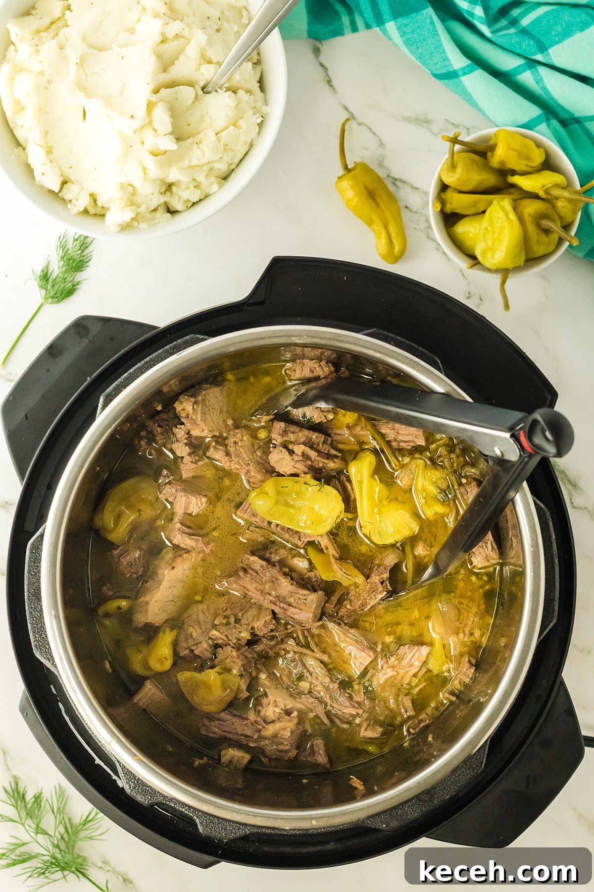 Pot Roast in Instant Pot ready to shred.