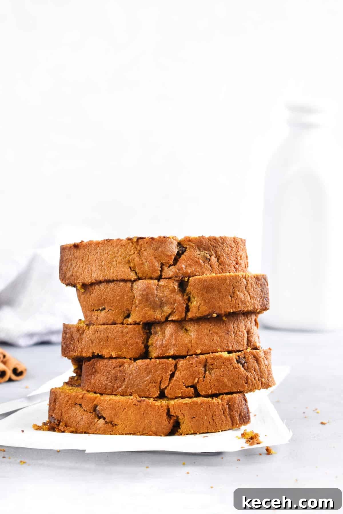 Warm Pumpkin Chocolate Chip Quick Bread: Moist Fall Loaf Recipe 5 How to bake pumpkin bread at high altitude showing stack of slices.