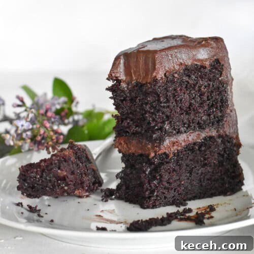 upright slice of cake with bite out of it.