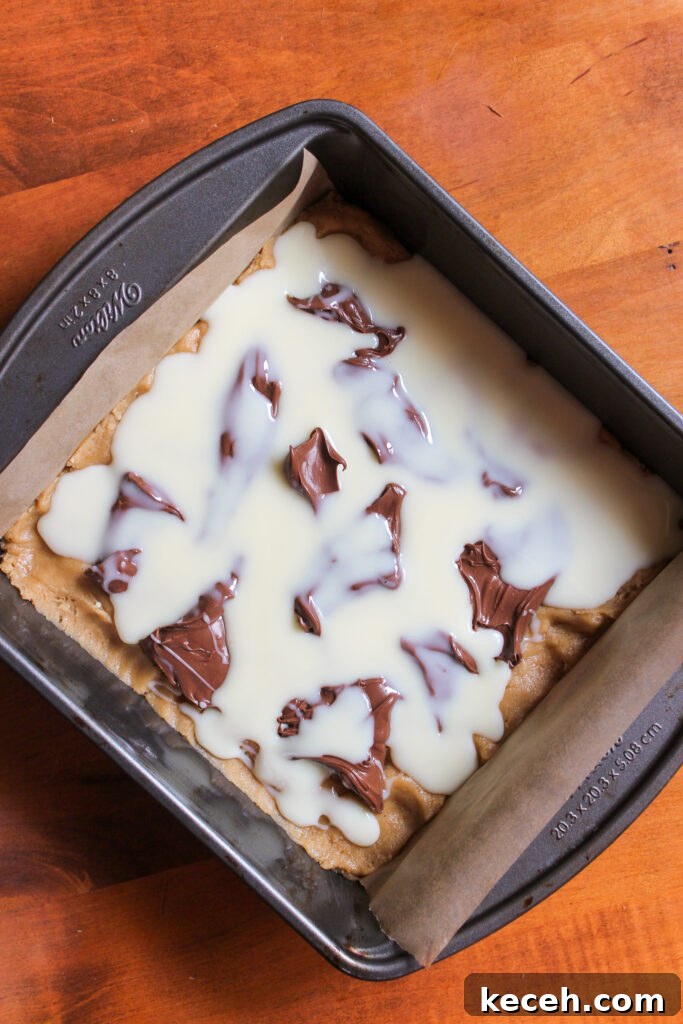 Nutella and Condensed Milk Dessert Bars: Gooey Chocolate Hazelnut Squares 6 Layered bars before baking