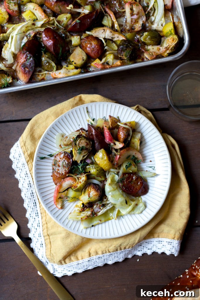Sausage, Apple & Veggie Sheet Pan Dinner Recipe 11 Sausage & Fall Veggie Sheet Pan Dinner plate