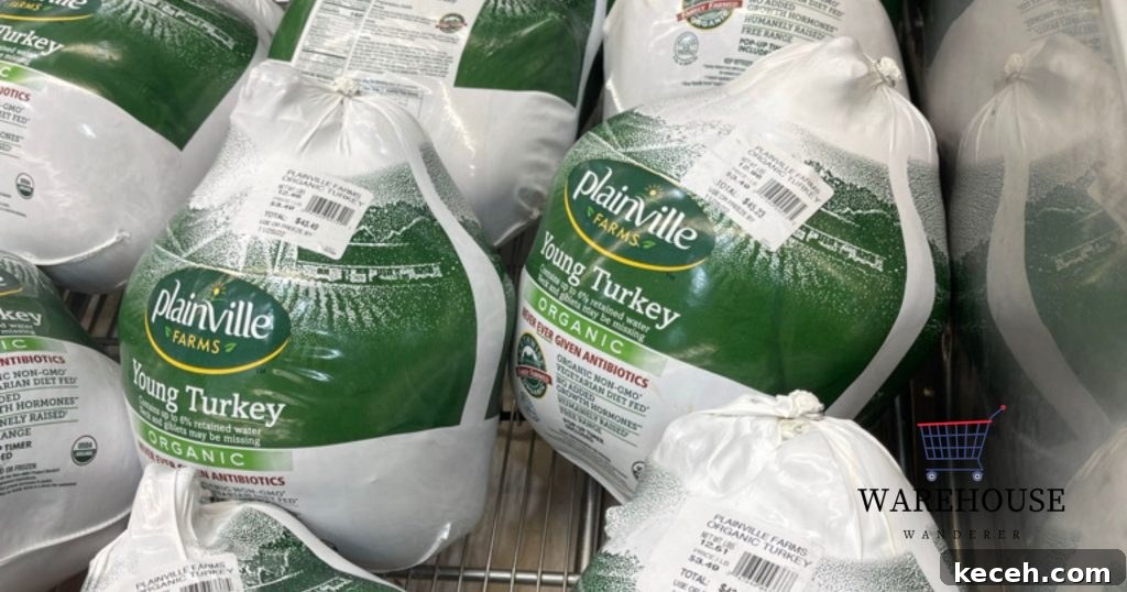 Costco turkey display with fresh and frozen turkeys stacked in refrigerated cases.