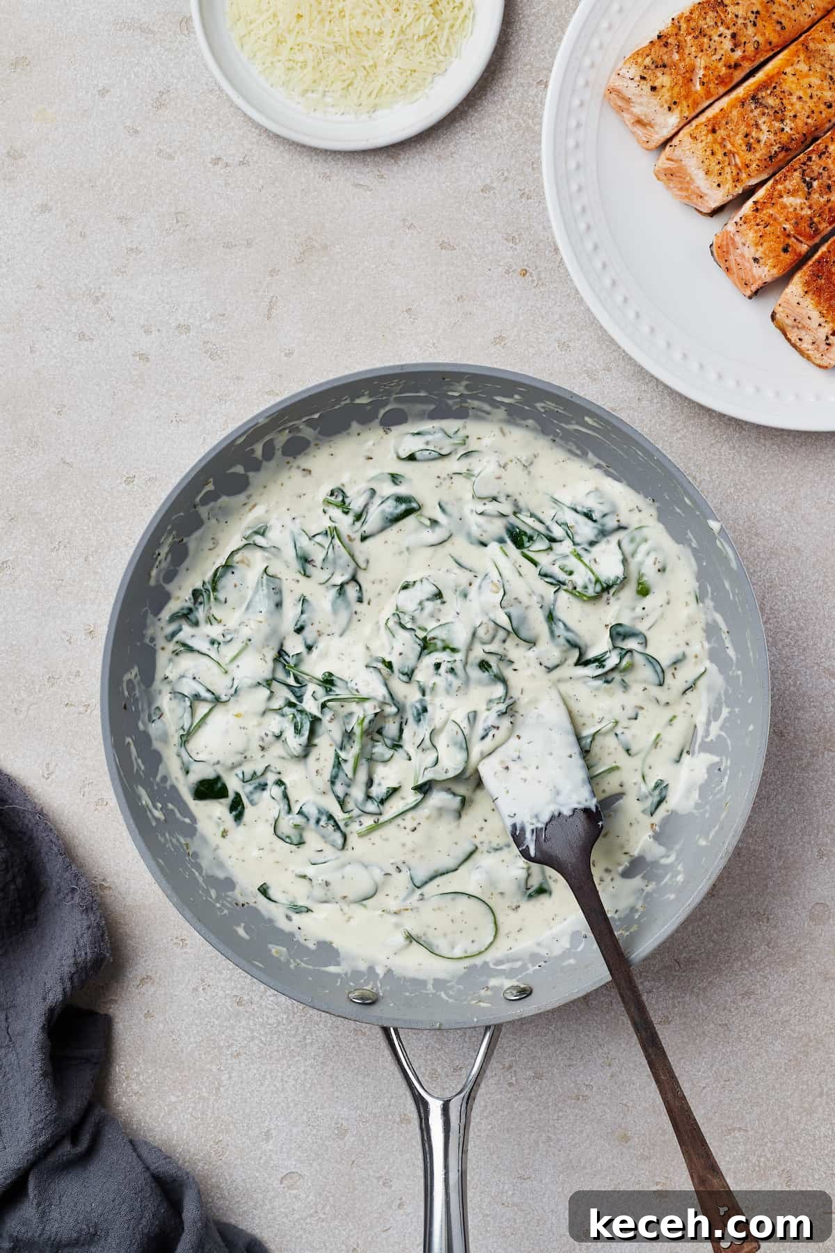 Creamy Spinach Salmon Florentine Recipe for Weeknight Dinners 8 A creamy spinach sauce in a nonstick skillet.