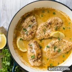 keto skillet lemon pepper chicken recipe on eatbetterrecipes.com Lemon Pepper Chicken Recipe with Creamy Garlic Lemon Sauce @eatbetterrecipes