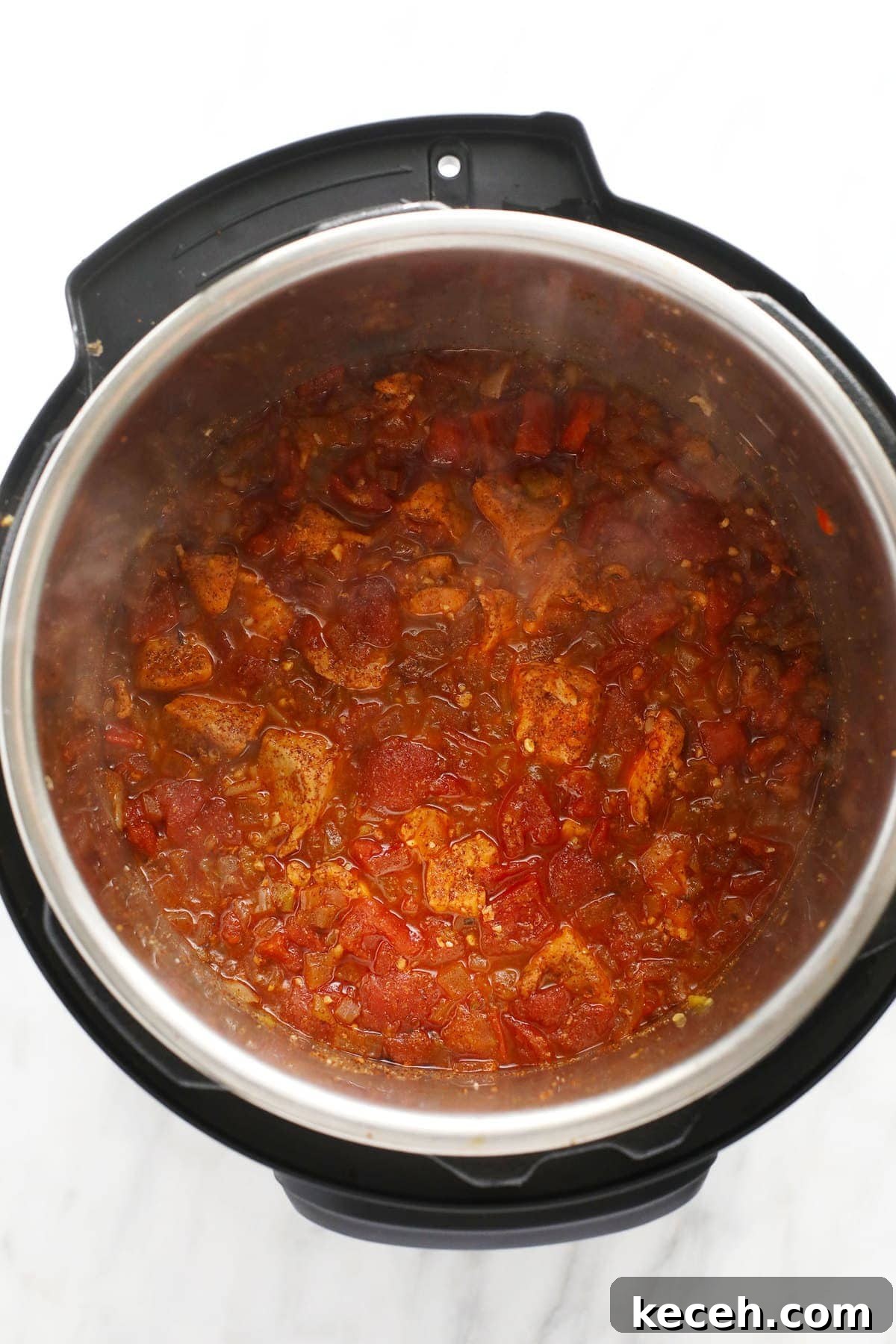 Chicken and tomatoes sauteed chicken and tomatoes in the instant pot for instant pot burrito bowls
