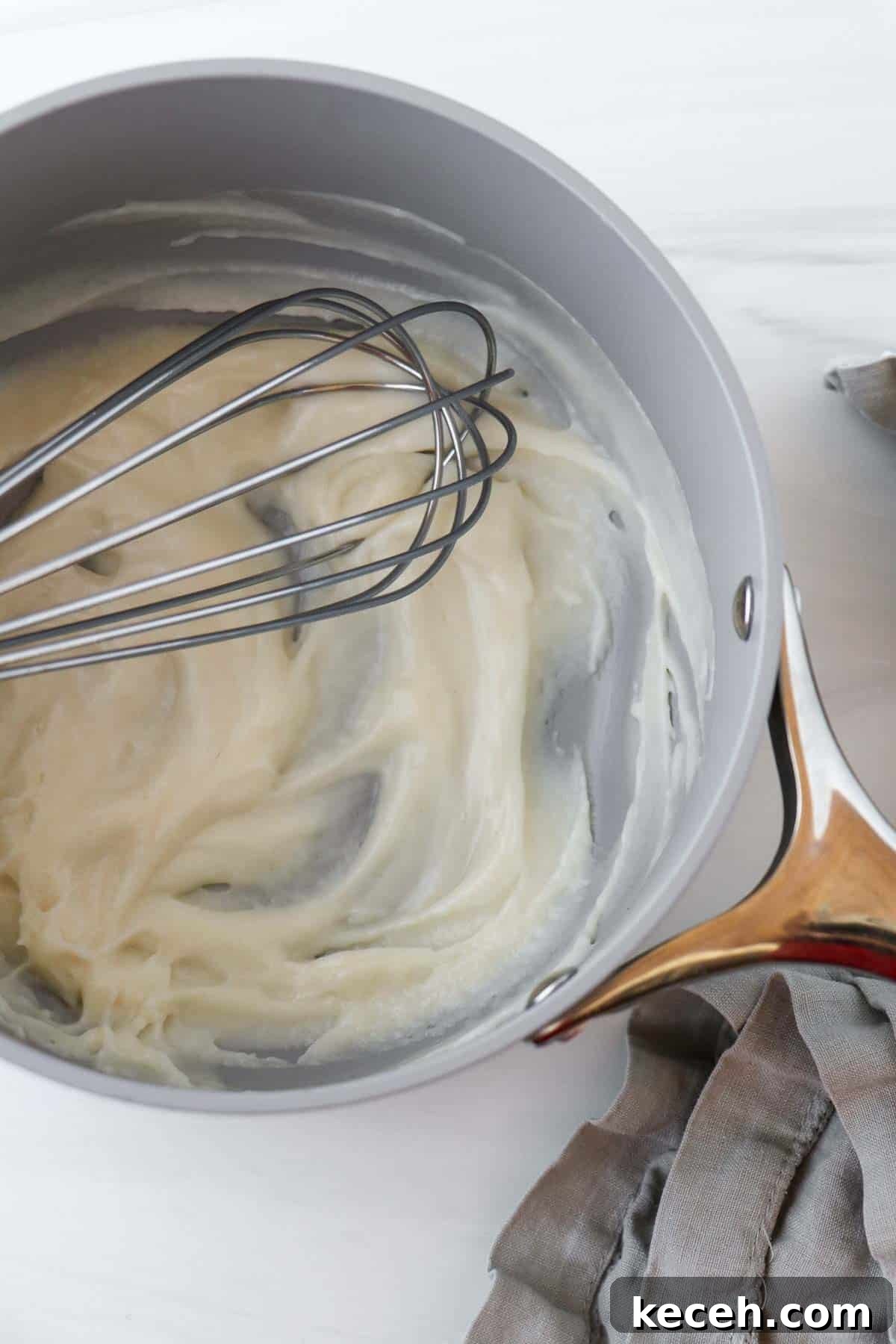 Tangzhong Method: Make Soft, Tender Breads and Buns Every Time 4 Tangzhong in a saucepan with a whisk.