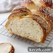 Tangzhong Method: Make Soft, Tender Breads and Buns Every Time 7 Sugar-topped Cardamom Bread (Finnish Pulla) on a colling rack.