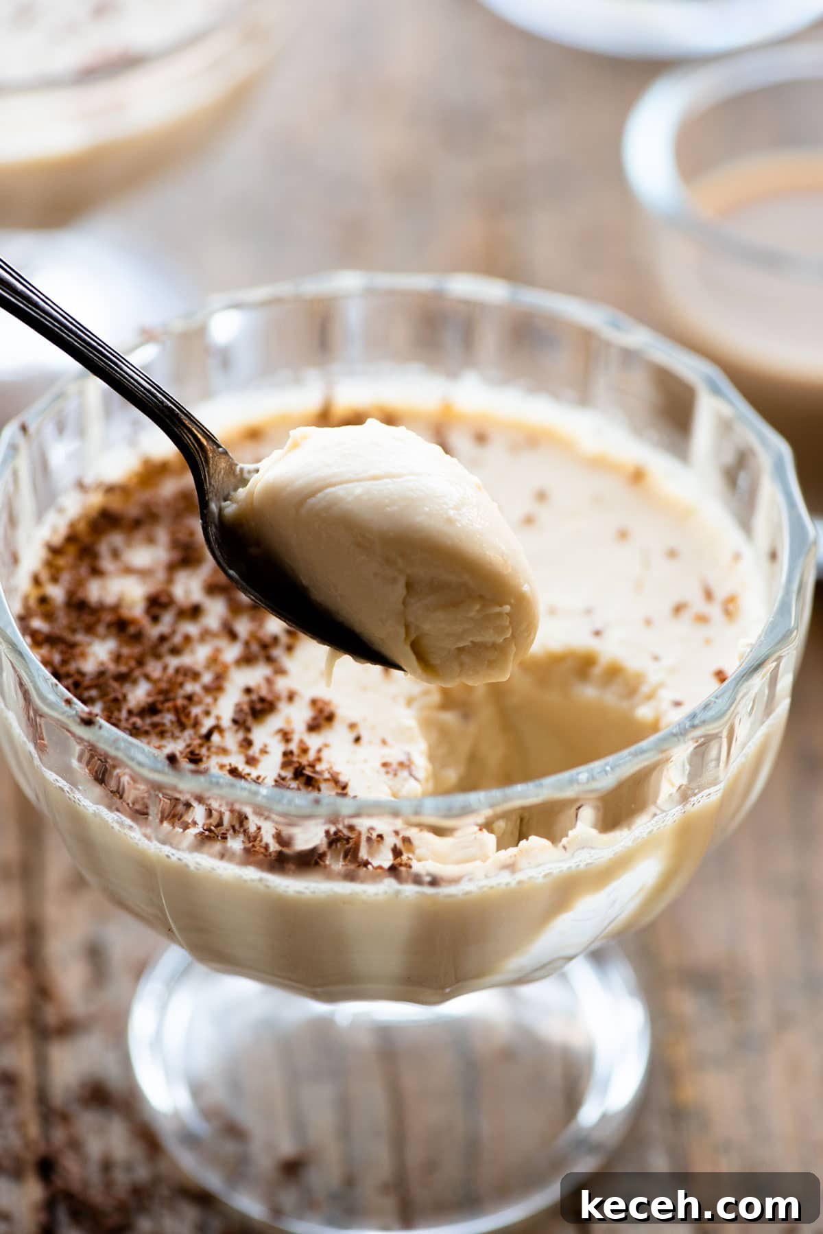 Bailey’s Liqueur Panna Cotta Recipe: Silky Boozy Dessert 6 A close up of a spoonful of a baileys panna cotta