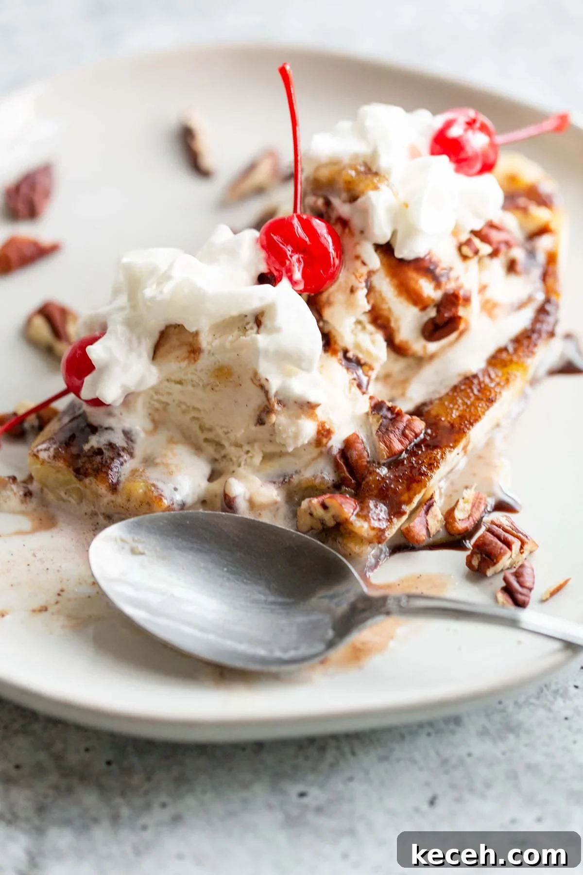 Air Fryer Banana Split Dessert with Warm Caramel and Crisp Toppings 9 Banana split half eaten.