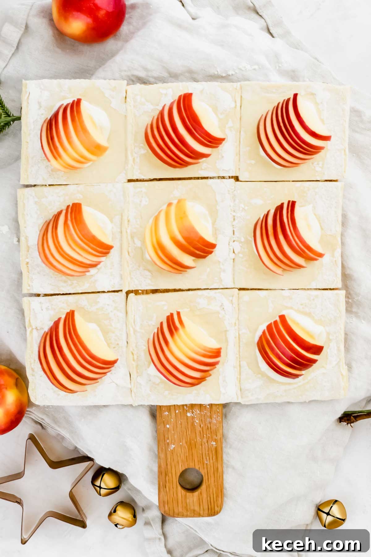 puff pastry cut into 9 squares and each square topped with apple slices.