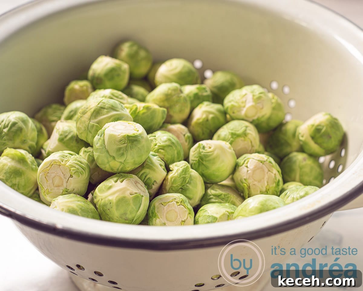 Bourbon-Glazed Brussels Sprouts with Crispy Bacon 4 Brussels sprouts in a colander