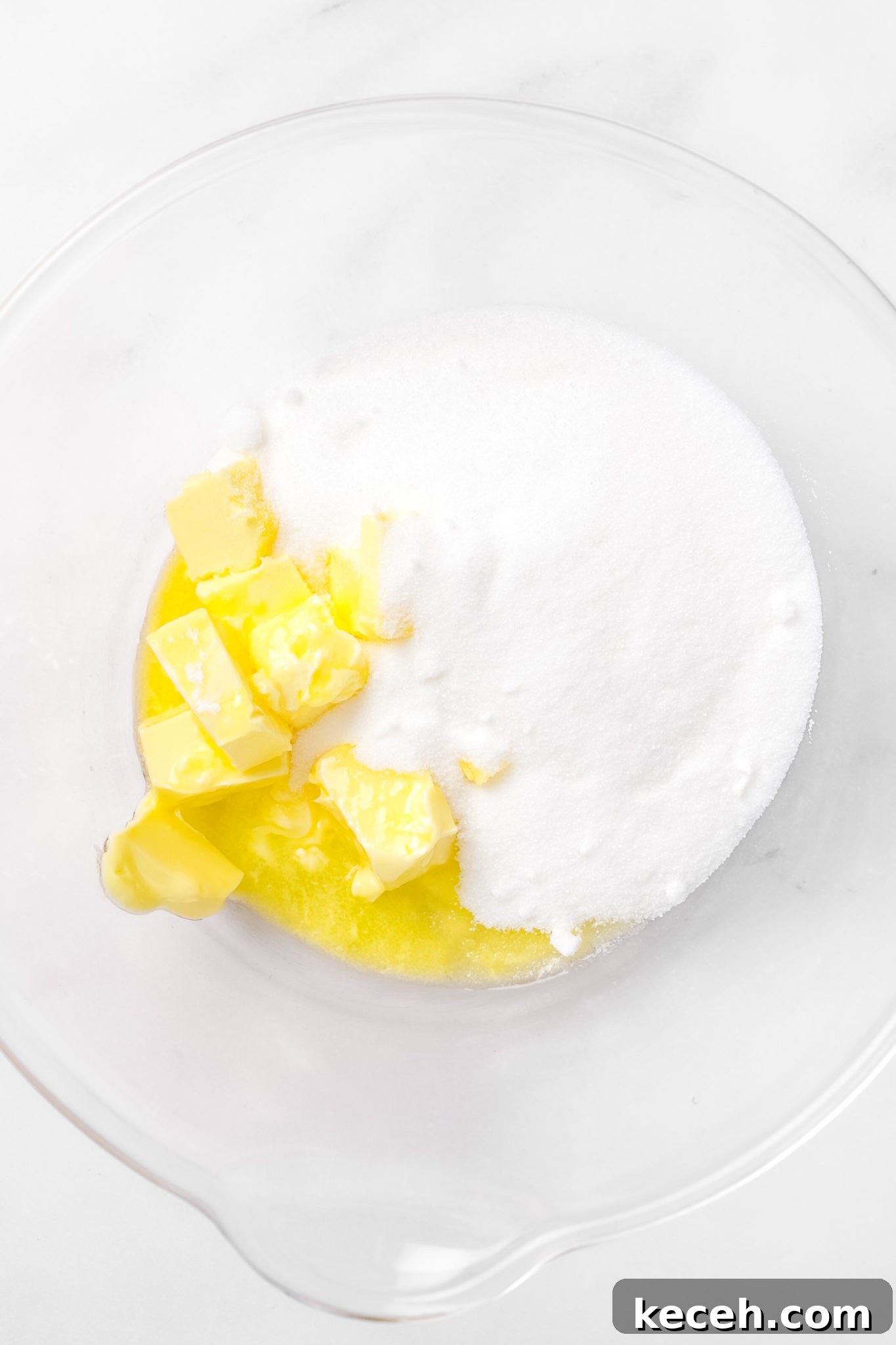 How to Make Colorful Rainbow Cupcakes at Home 4 mixing bowl with butter and sugar creamed for rainbow cupcakes batter