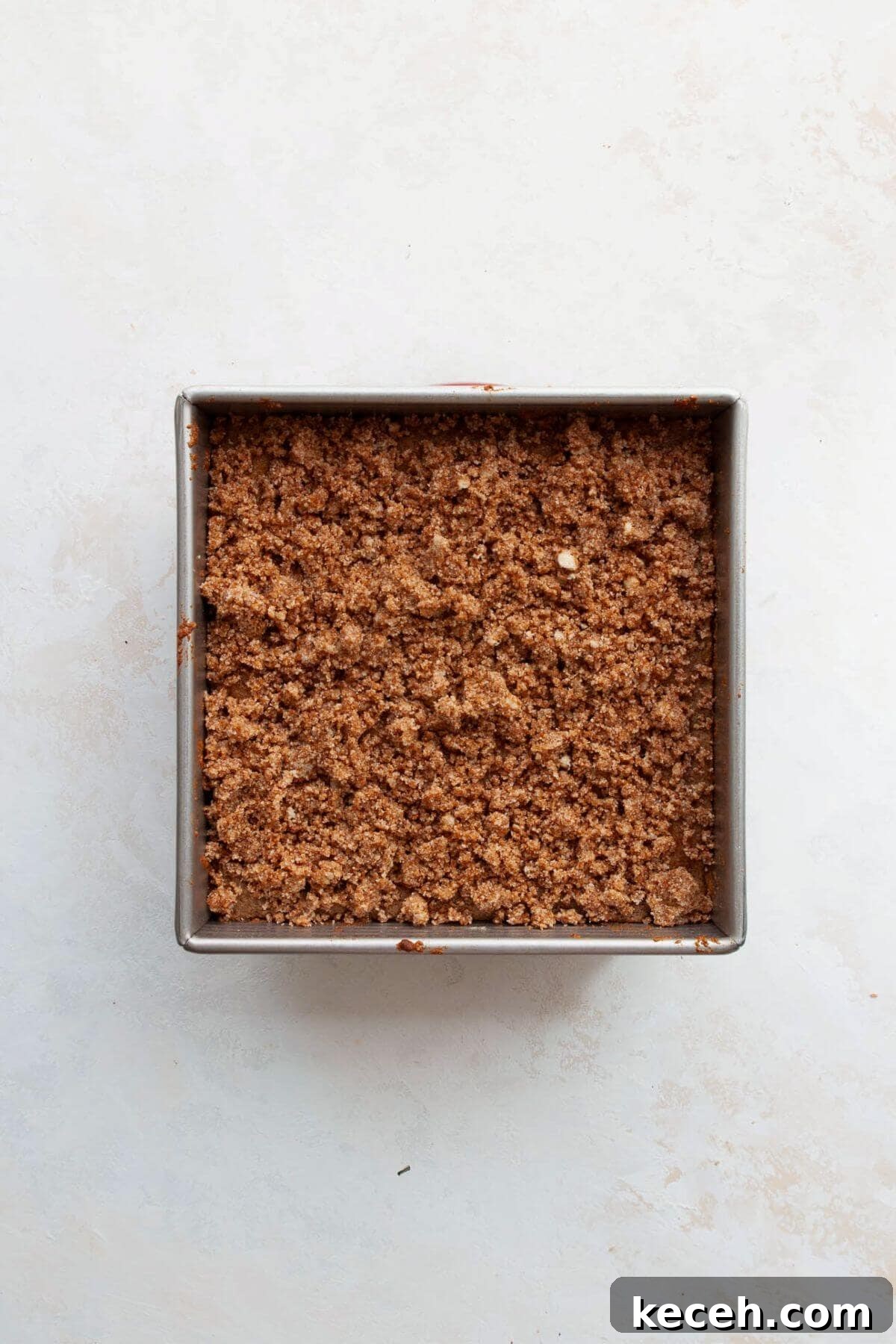 Moist Whole Wheat Coffee Cake with Yogurt and Honey 9 Crumb topping added to coffee cake batter before baking.
