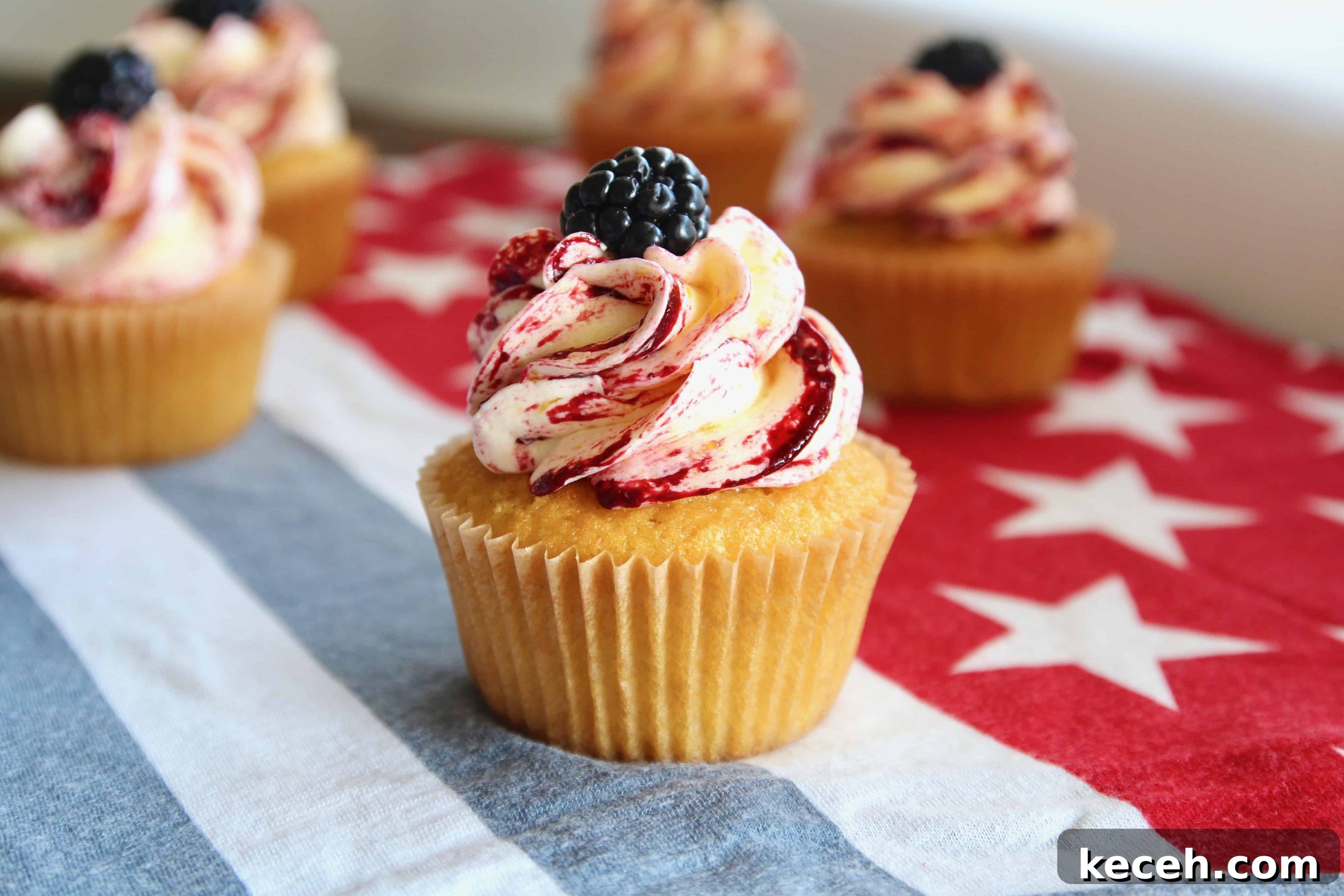 These corn cupcakes are jam packed with corn! There’s corn in the fluffy cupcakes, and corn in the silky buttercream frosting, kissed with tart and fruity blackberries!