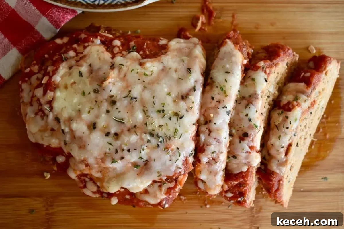 Italian-Style Turkey Meatloaf with Herbs and Parmesan 7 Marinara and mozzarella on top.