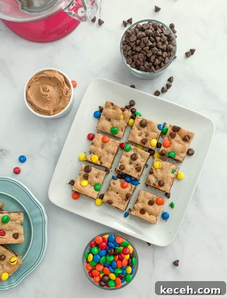 Peanut Butter Cookie Bars with M&M's: Chewy Chocolate Candy Bars 2 A platter of colorful M&M bars