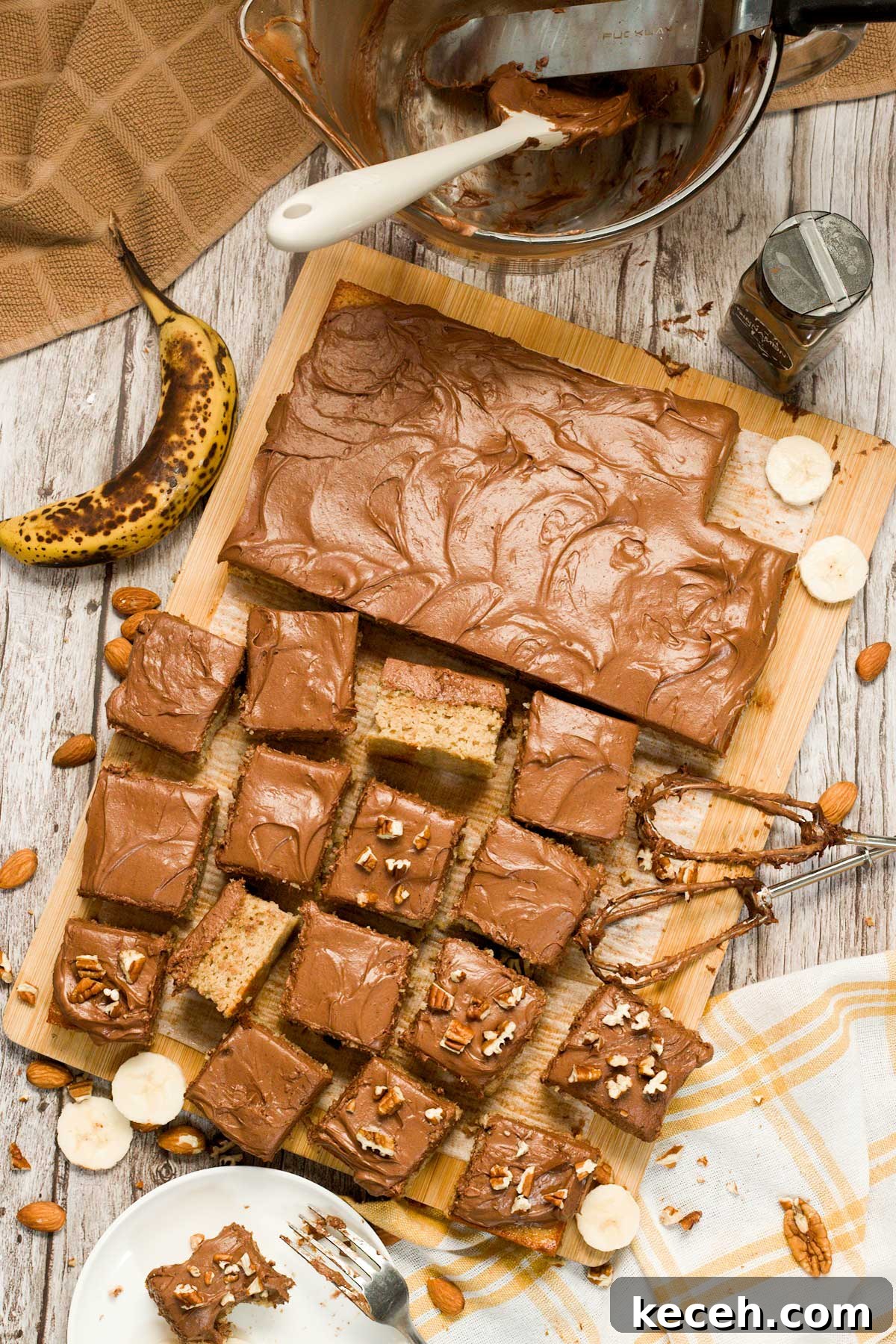 Gluten-Free Banana Cake with Chocolate Frosting Recipe 3 Gluten-free banana cake with chocolate cream cheese frosting cut into squares.