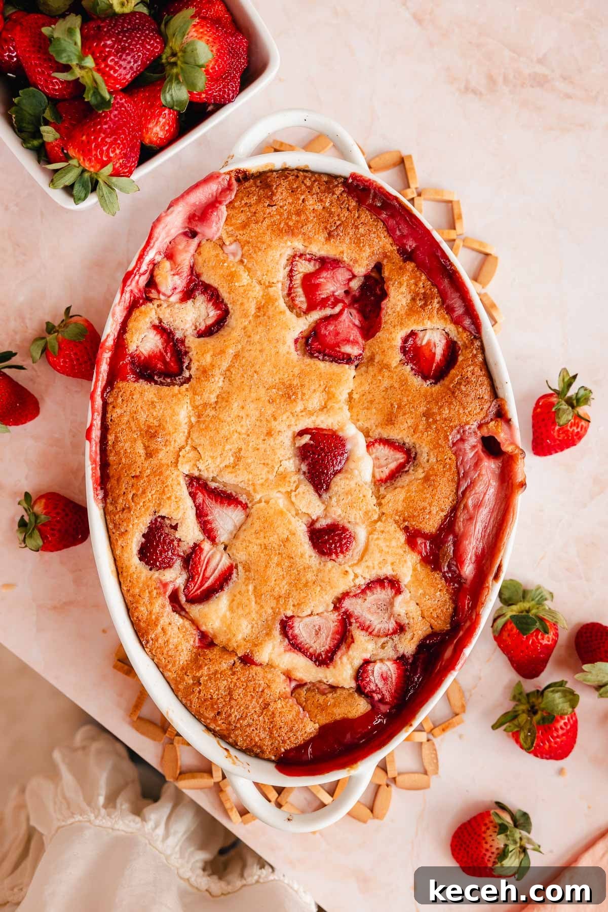 Cream Cheese Strawberry Cobbler Recipe — Sweet Rustic Dessert 11 baked strawberry cobbler in oval pan