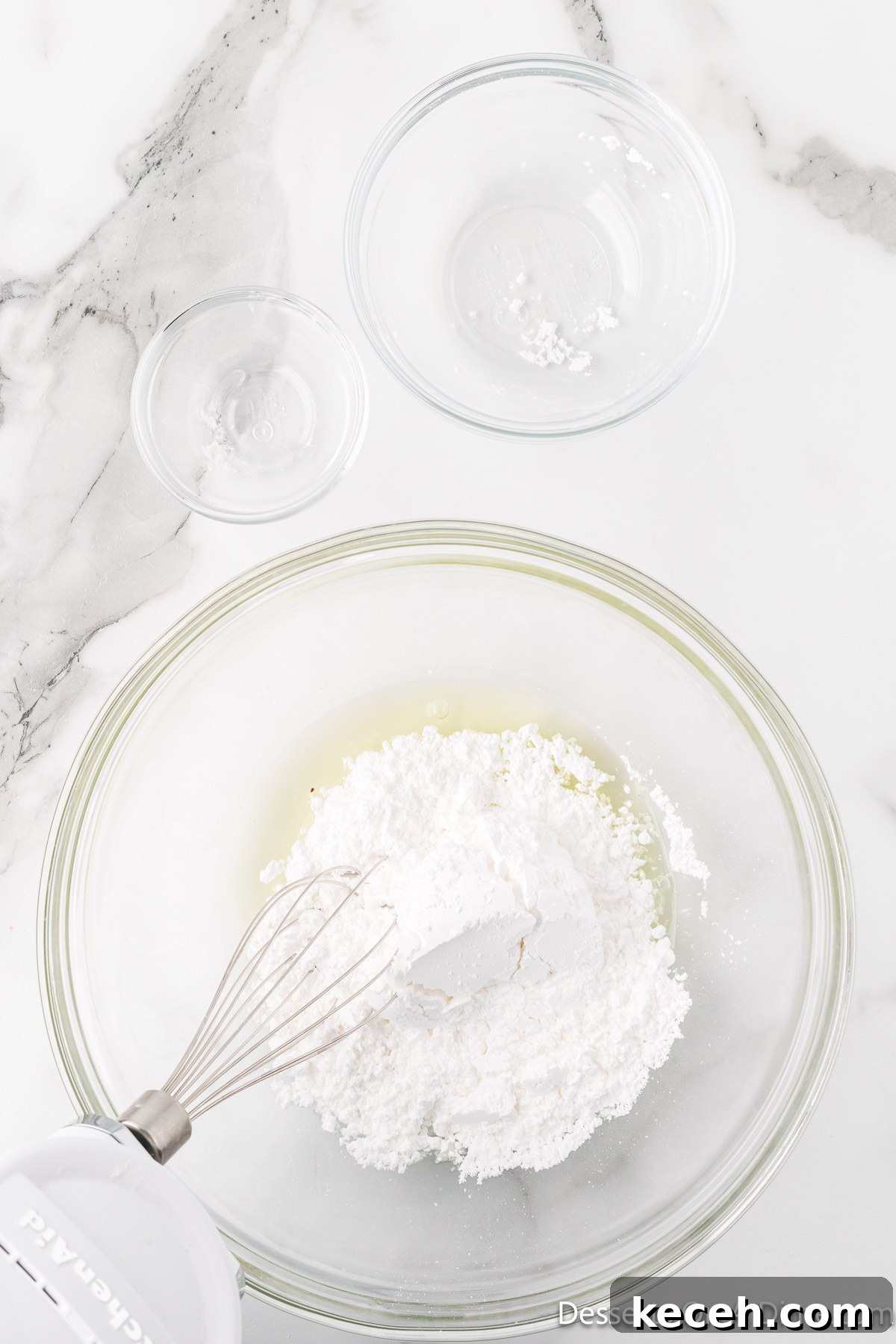 Powdered sugar added to bowl and combined. 