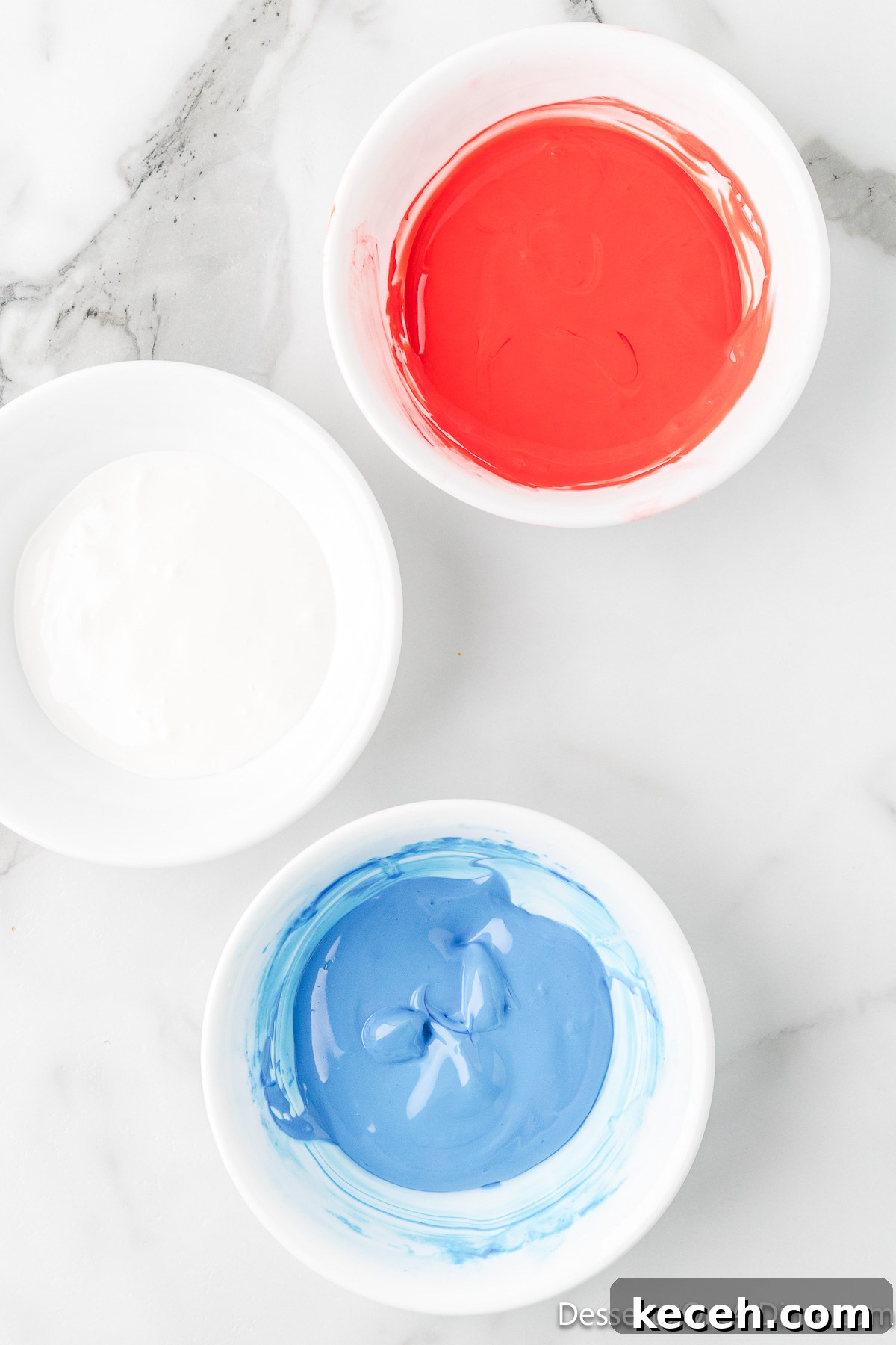Food coloring added to 3 bowls. 