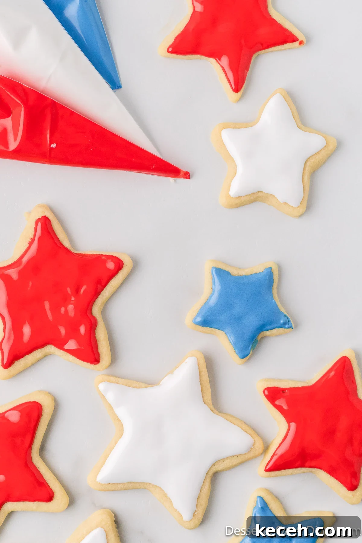 Icing piped on cookies. 