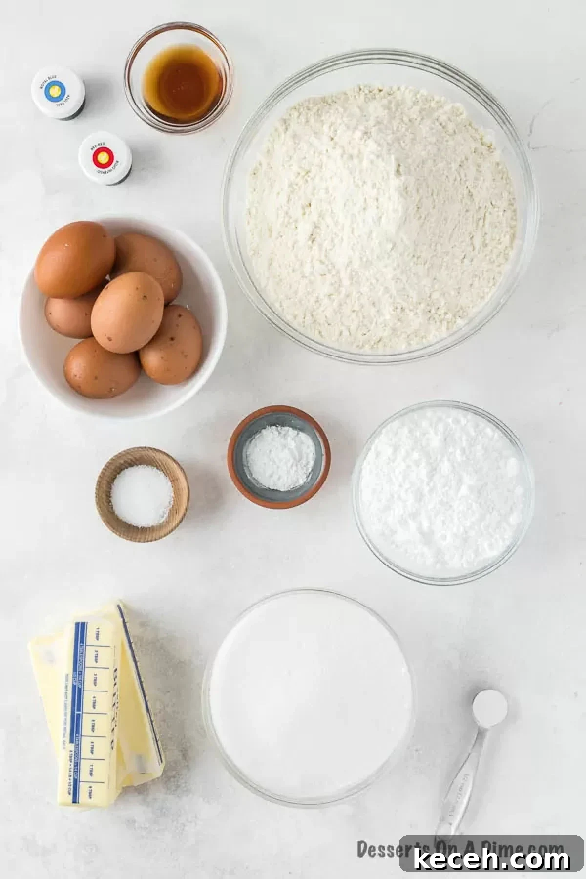 Ingredients for 4th of July sugar cookies - flour, baking powder, salt, unsalted butter, sugar, eggs, vanilla, egg whites, powdered sugar, cream of tartar and gel food coloring. 