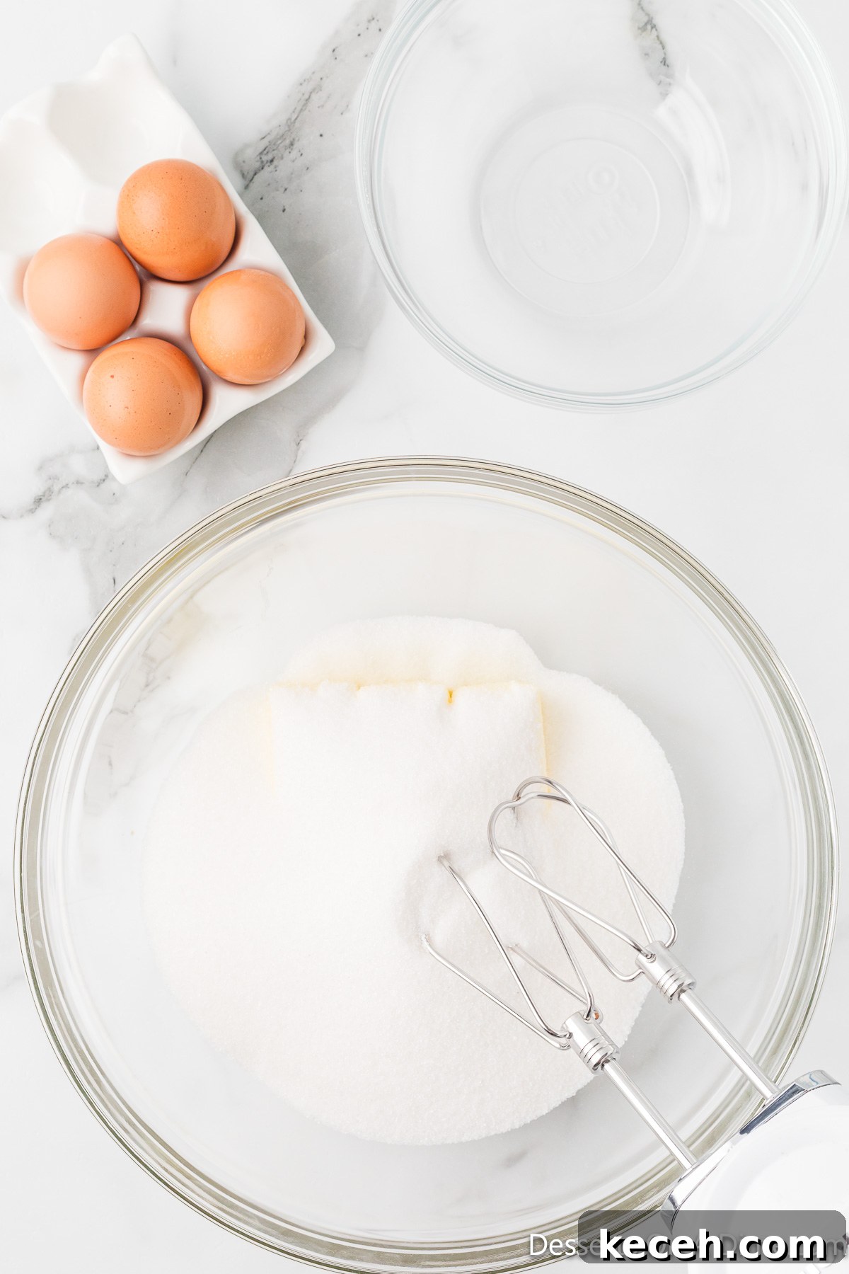 Mixing bowl with softened butter and sugar. 
