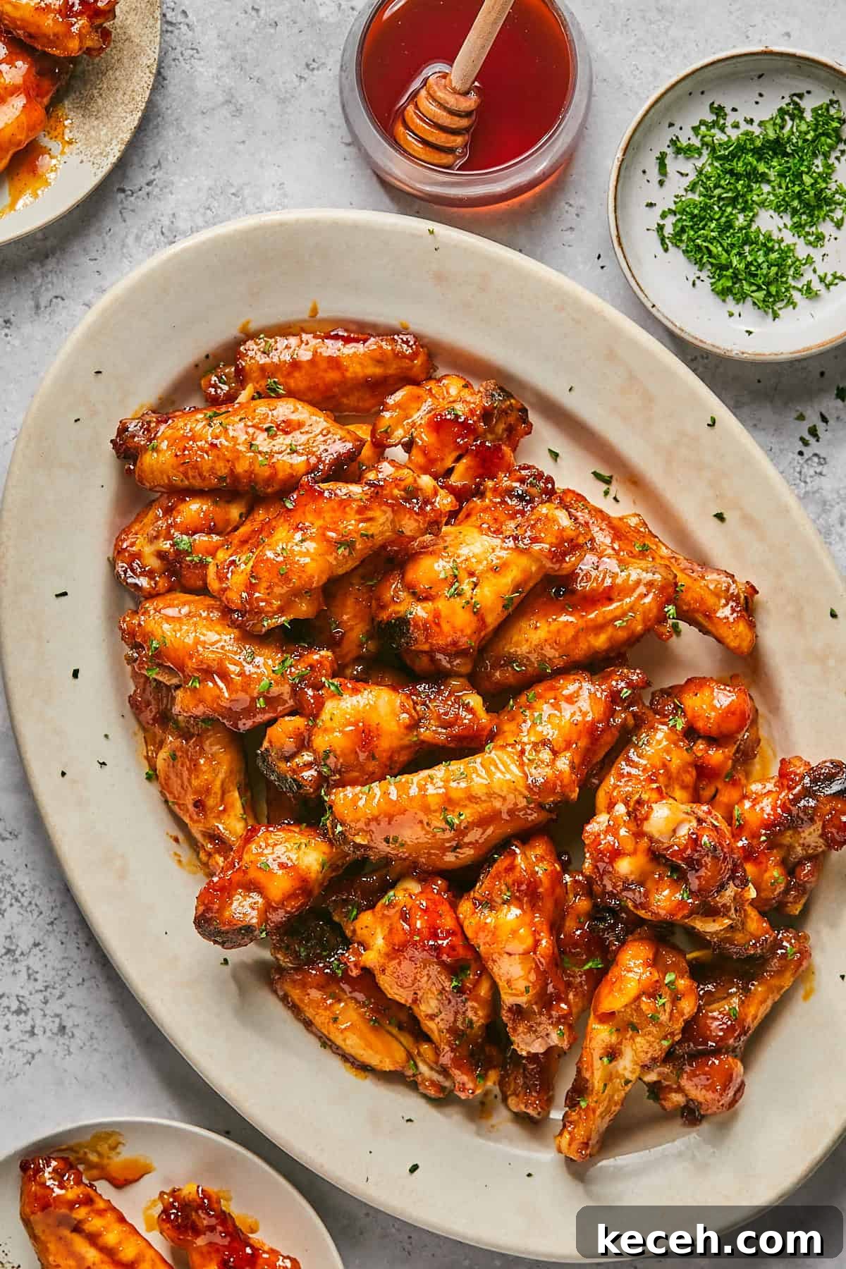 hot honey chicken wings on a platter