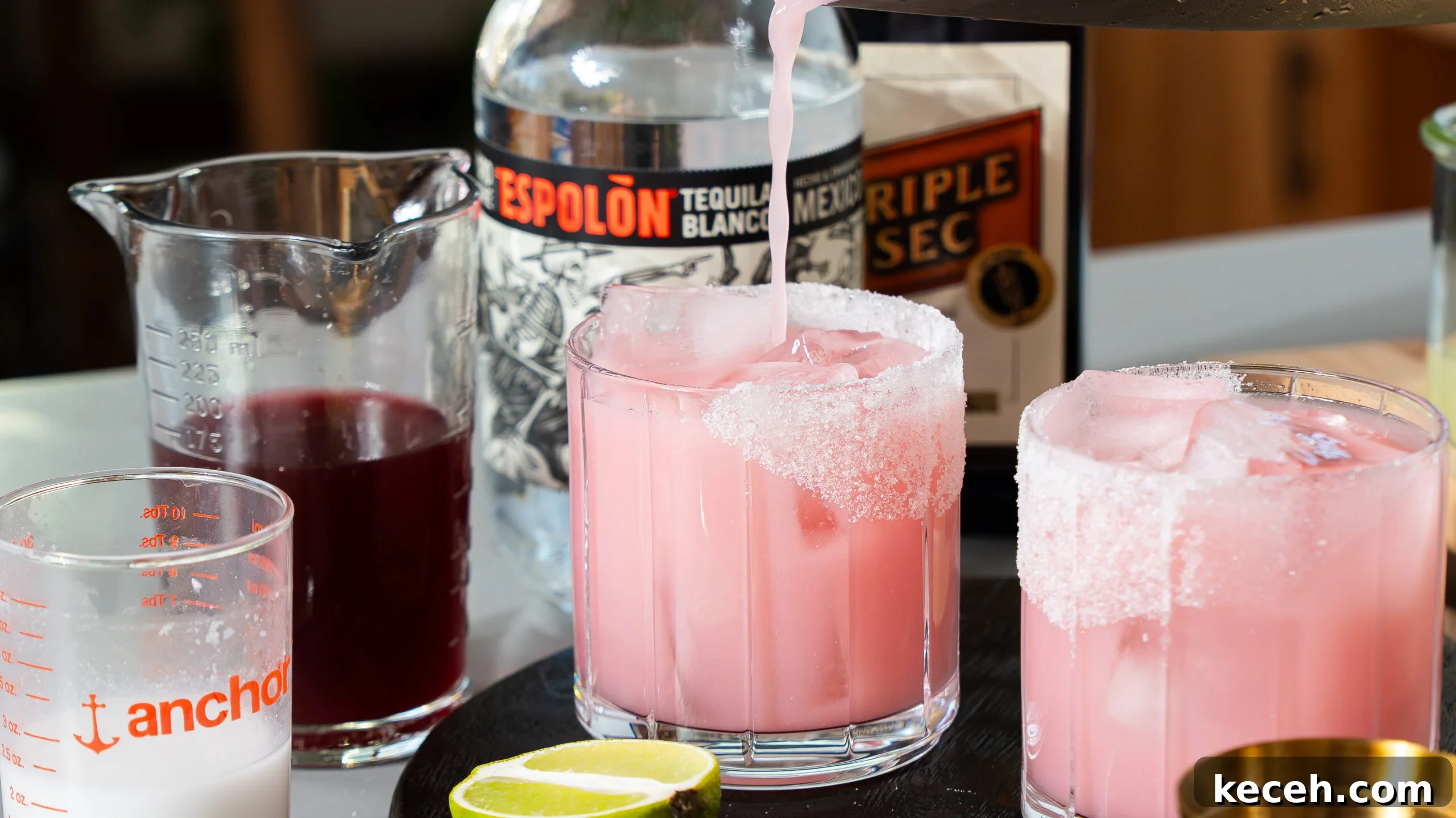 Cranberry Coconut Lime Christmas Margarita Recipe 4 Christmas margaritas in a glass.