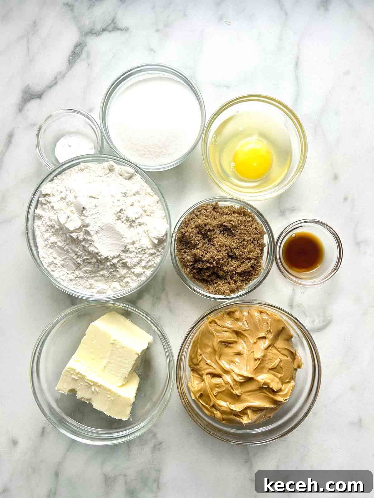 Chewy Peanut Butter Cookies Recipe with Crispy Edges 4 ingredients prepped in bowls.