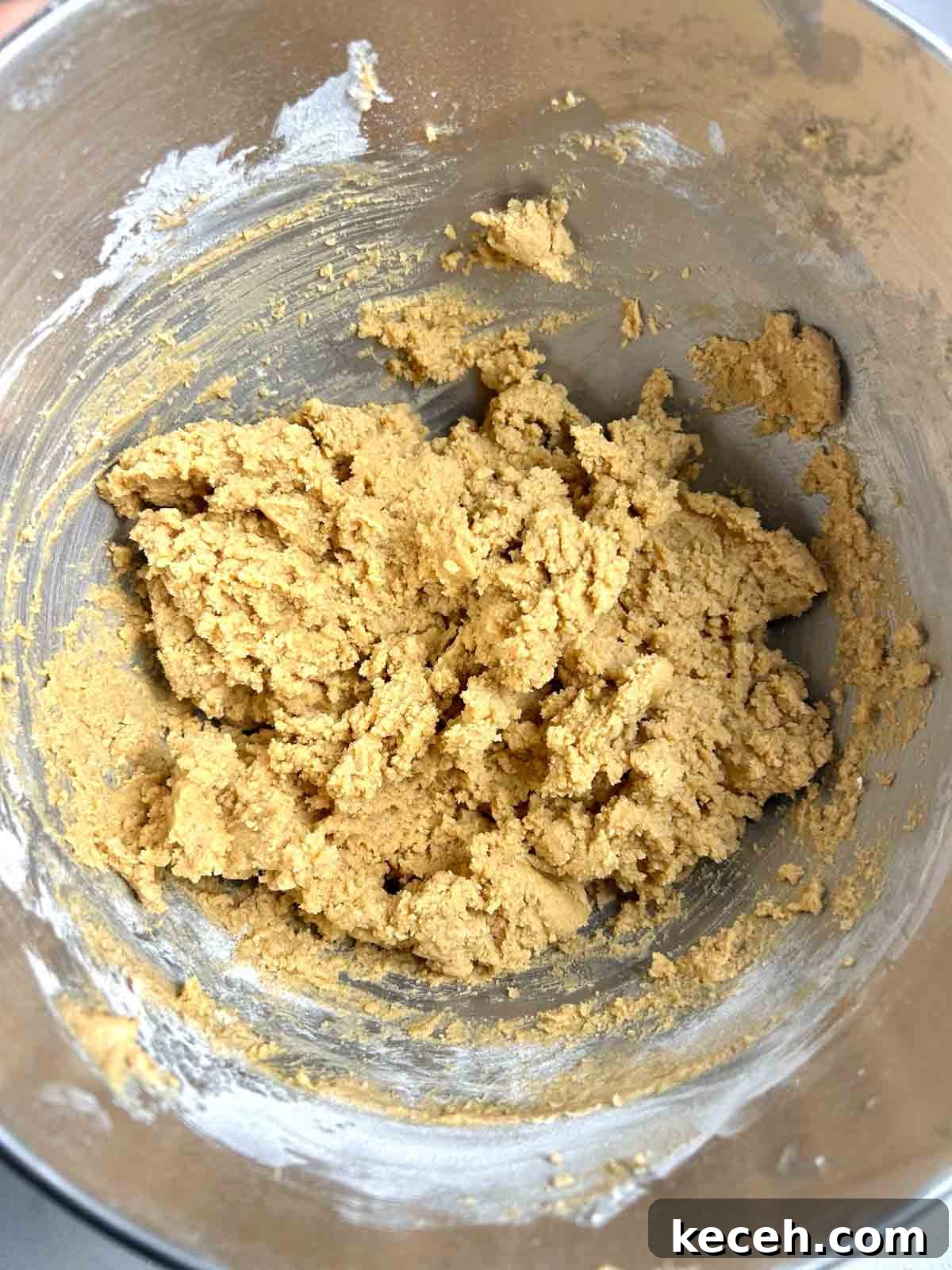 Chewy Peanut Butter Cookies Recipe with Crispy Edges 6 dough mixed together in stand mixer bowl.