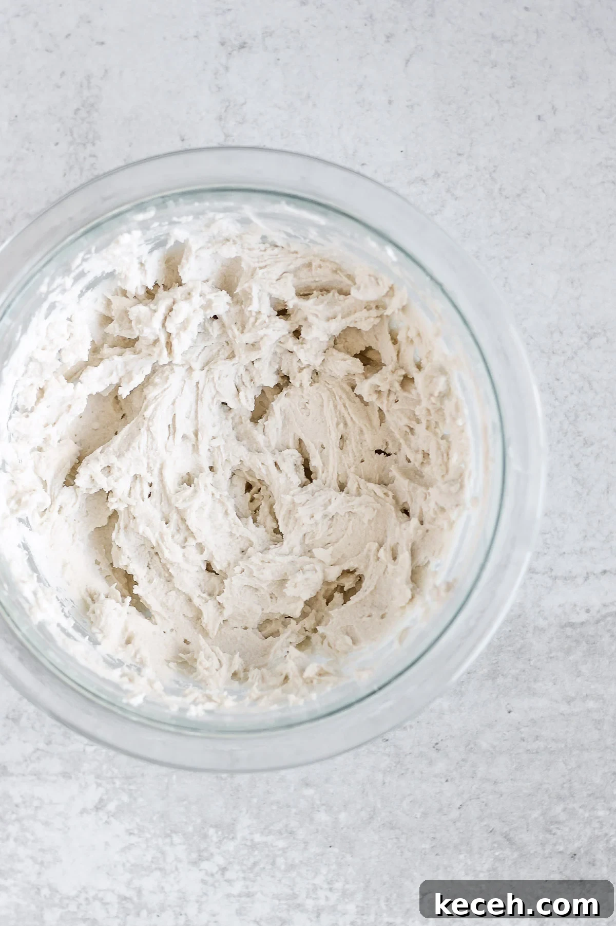 Coconut Whipped Cream Recipe: Light, Dairy-Free Topping 6 coconut whipped cream in glass mixing bowl