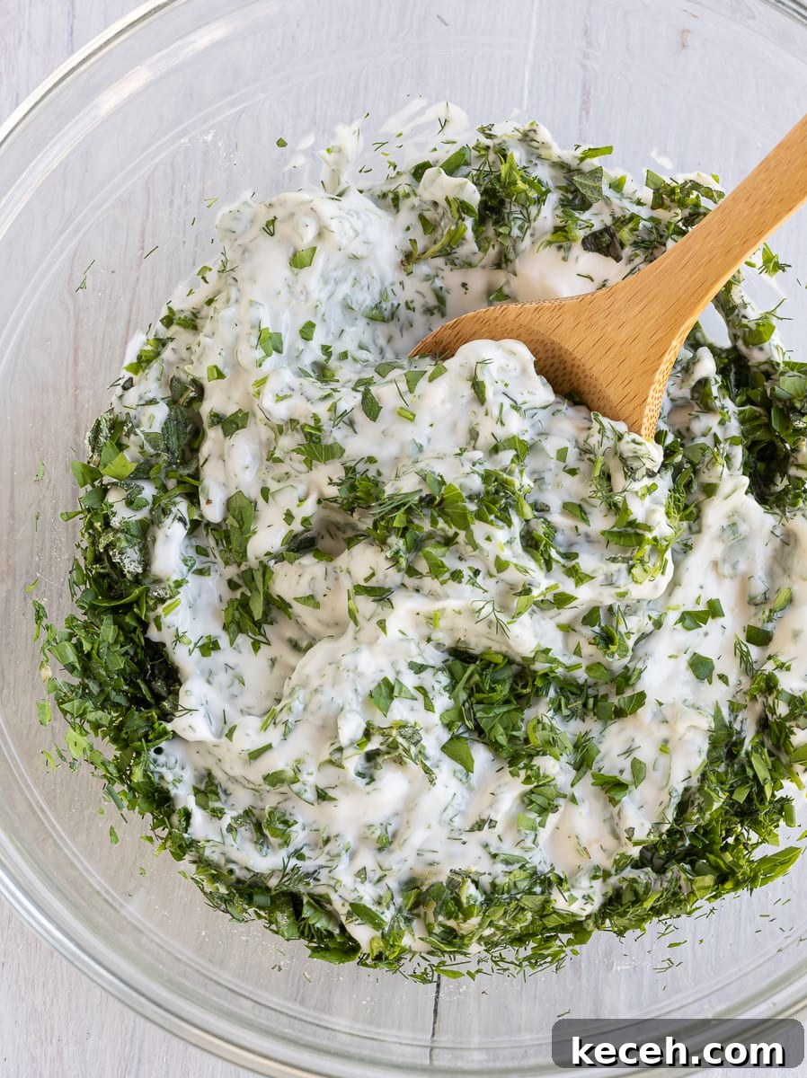 Creamy Green Goddess Dressing & Herb Dip Recipe 6 Green Goddess dressing being mixed.