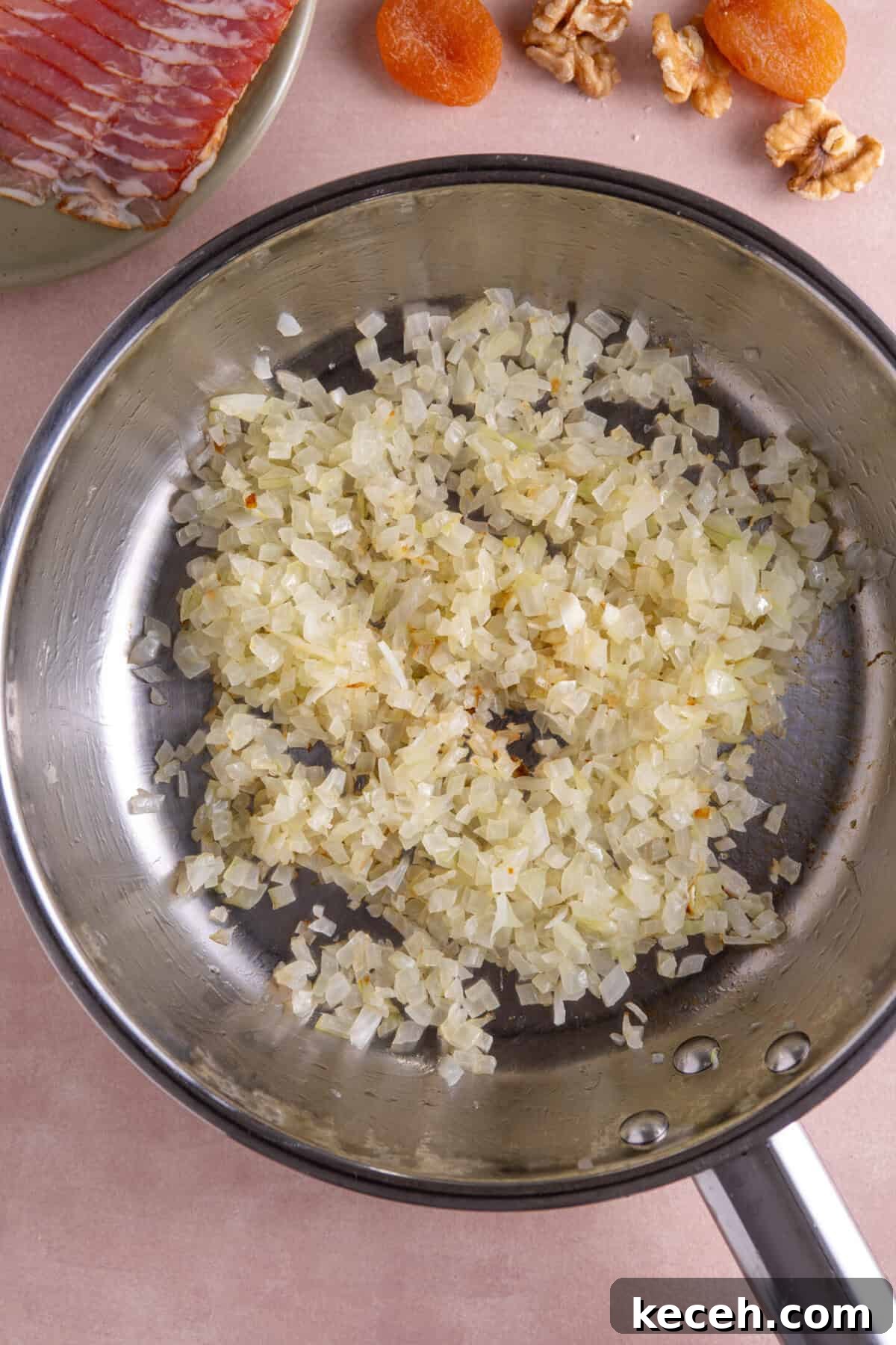 Fry the onions off in a frying pan.