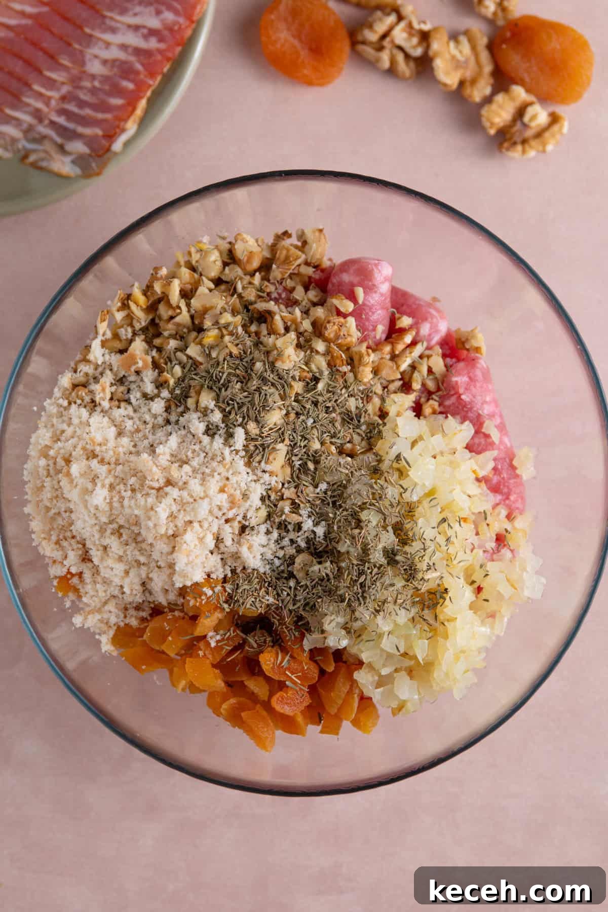 Add all the ingredients for the stuffing balls into a large mixing bowl.