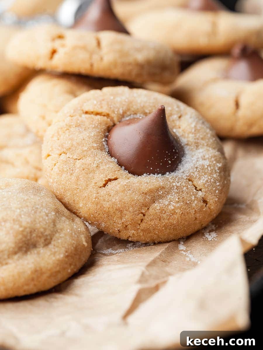 Gluten-Free Peanut Butter Blossoms Cookies Recipe 2 gluten free peanut butter blossoms topped with hershey kisses