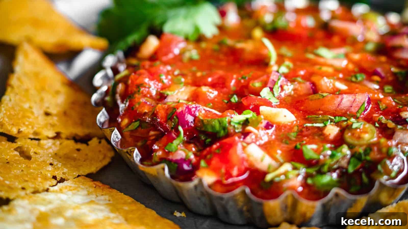 13 Delicious Low-Carb Mexican Recipes Worth Trying 14 Salsa in a container with chips around.