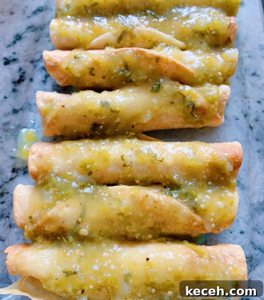 green enchiladas ready for the oven #greenenchiladas #chickenenchiladas