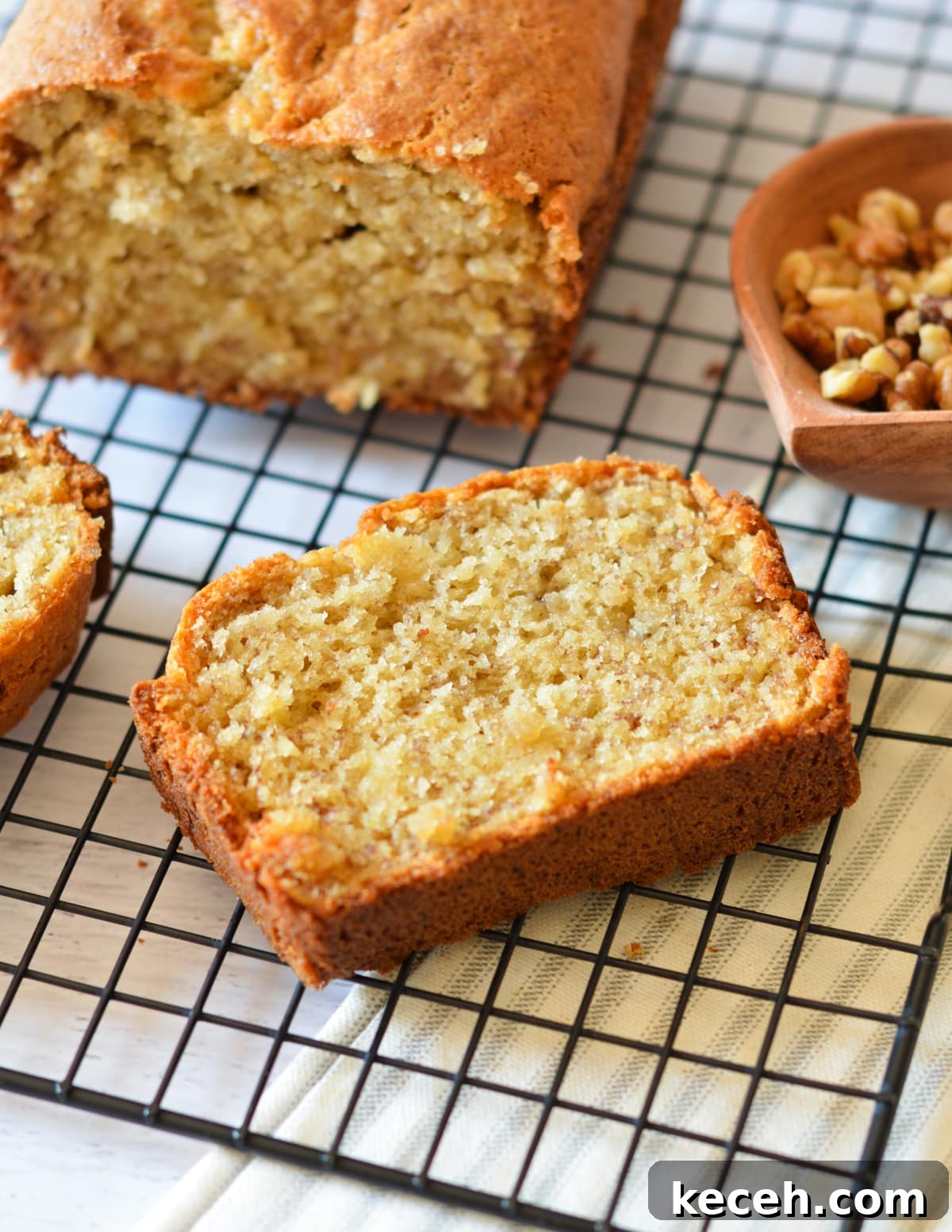 Moist Banana Bread Made with Frozen Bananas 2 a slice of banana bread.