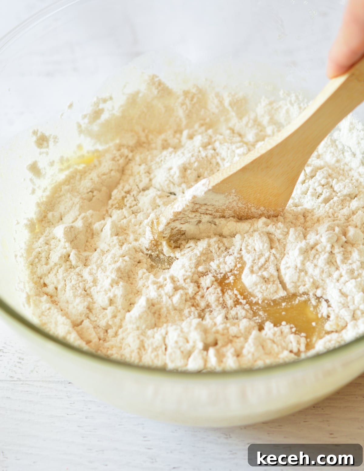 Moist Banana Bread Made with Frozen Bananas 9 stirring flour and mashed banana together.
