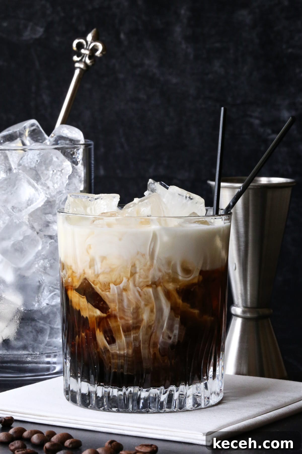 A classic White Russian recipe is a favorite with coffee lovers. A creamy, coffee-infused cocktail that's wonderful as an after dinner drink. white russian cocktail with cream swirling in glass