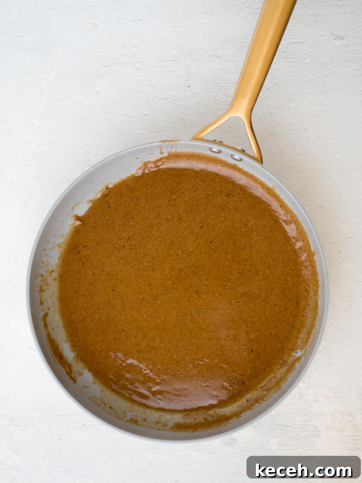 homemade enchilada sauce in a skillet