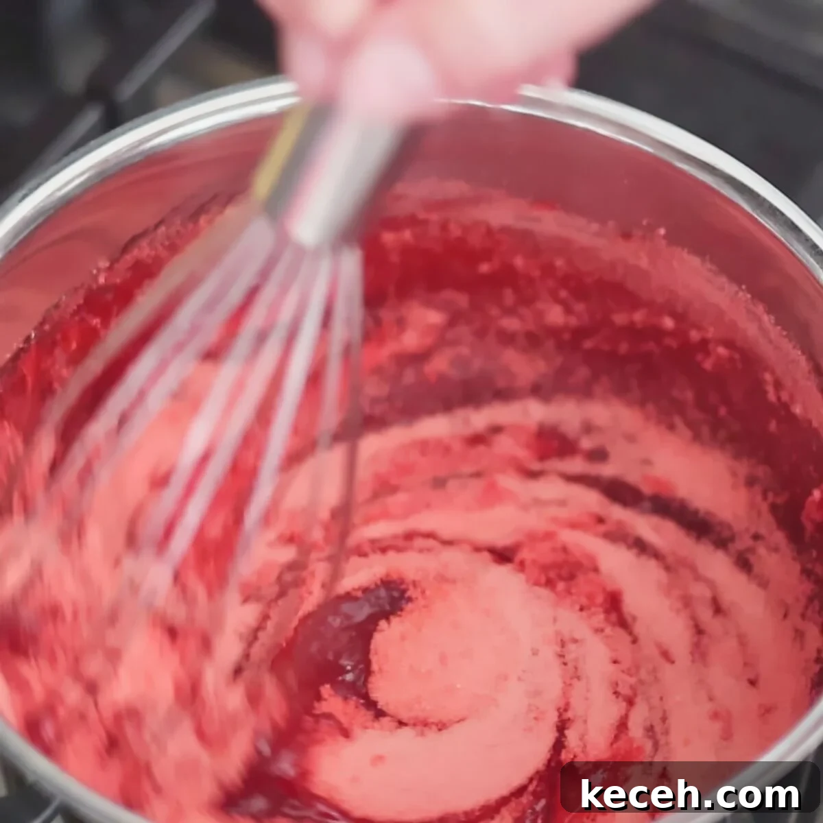 Gluten-Free Mixed Berry Pie Recipe — Fresh Summer Dessert 7 whisking strawberry jello powder into strawberry puree mixture in small saucepan.