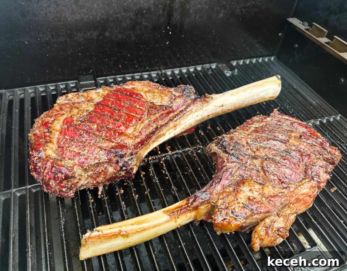 Smoked Tomahawk steaks on grill 