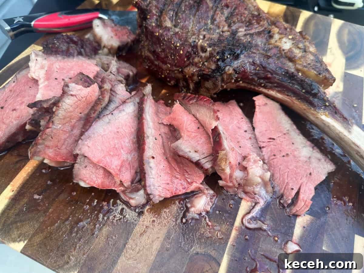 Tomahawk steak after sliced on cutting board. 