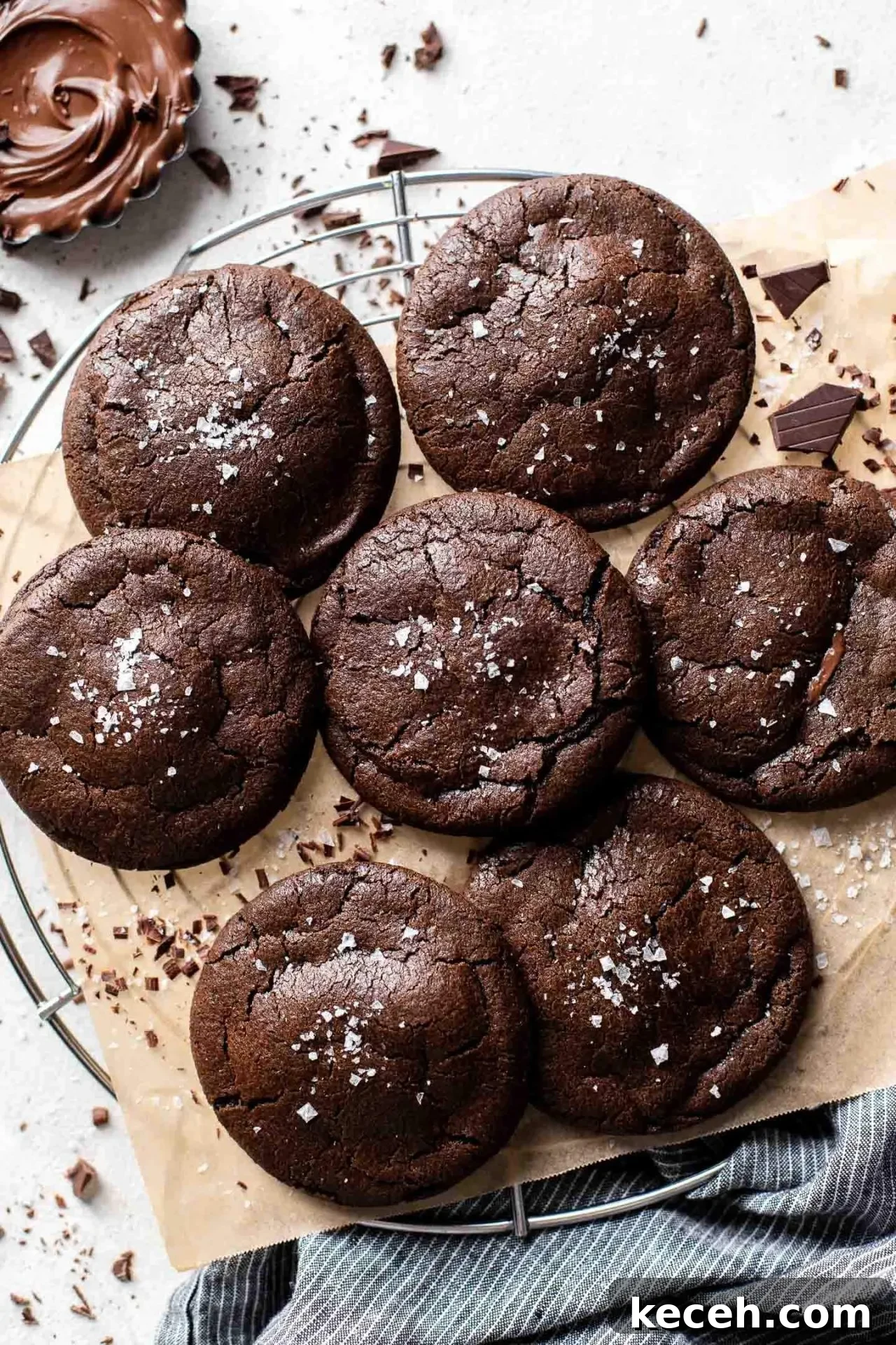Molten Nutella Chocolate Lava Cookies: Gooey Center Cookie Recipe 2 Nutella chocolate lava cookies on parchment lined wire rack