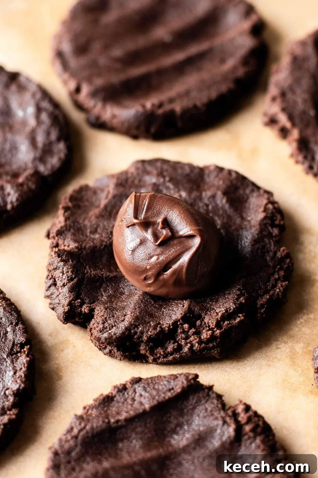 Molten Nutella Chocolate Lava Cookies: Gooey Center Cookie Recipe 11 Nutella chocolate lava cookie dough ball flattened into a disk with Nutella ball places in center
