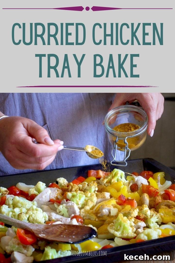 Curried Chicken Tray Bake Recipe from The Slimming Foodie 2 Woman in grey scattering a homemade spice blend over a baking tray of chopped veggies and chicken