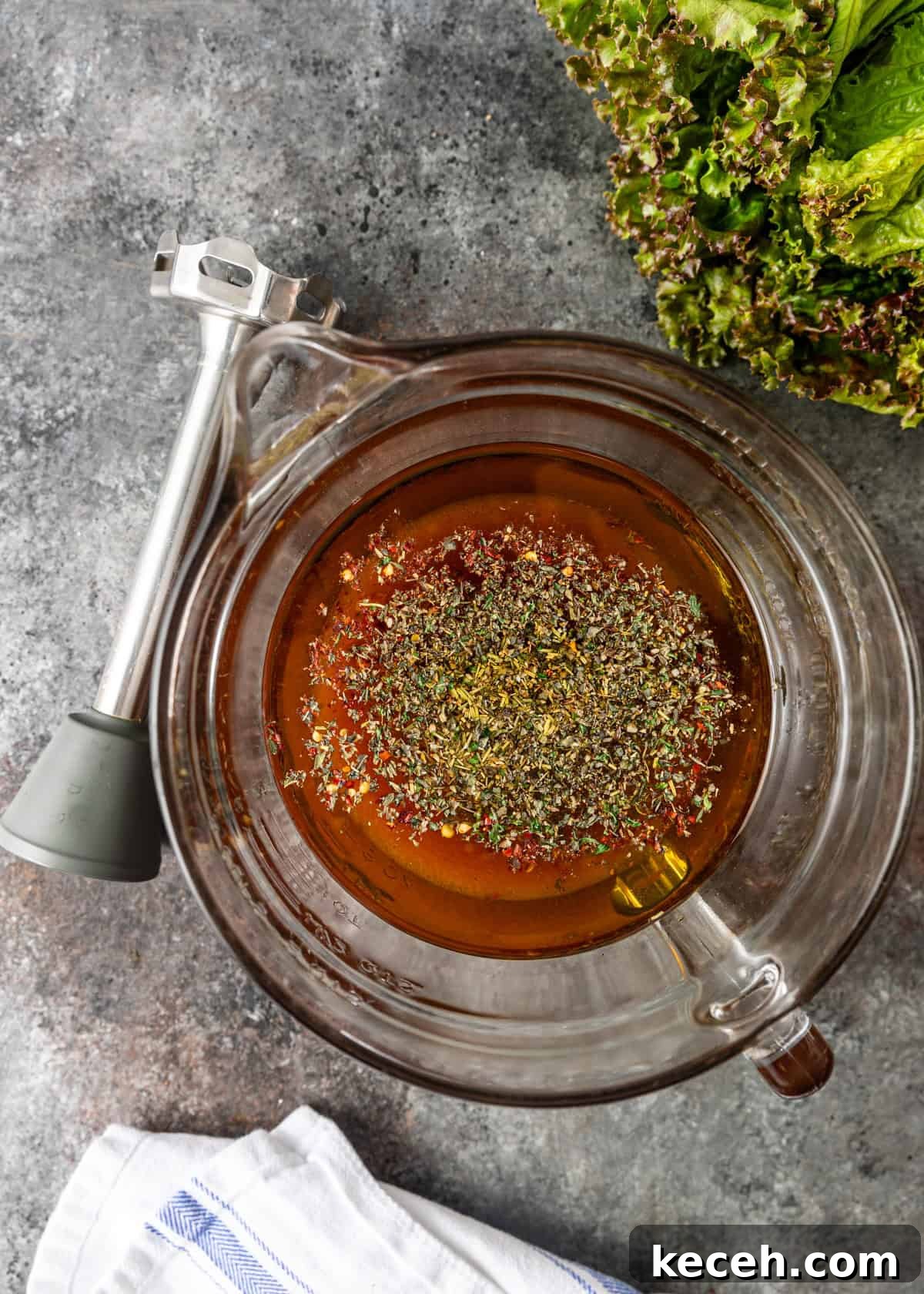 Two Homemade Italian Salad Dressings: Classic & Zesty Variations 4 overhead process shot: homemade italian dressing in a glass measuring cup before blending